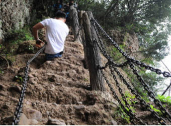 A Man With No Legs Climbed The Most Dangerous Mountain In All Of China.