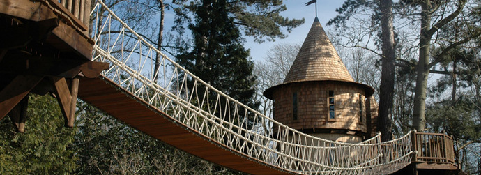 This Family Lives In A Tree House That Looks Like A Castle. Think That’s Cool? Wait Until You See The Inside.