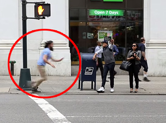 Happy Guy Goes Around High Fiving New Yorkers Trying To Hail A Taxi. SO Awesome.