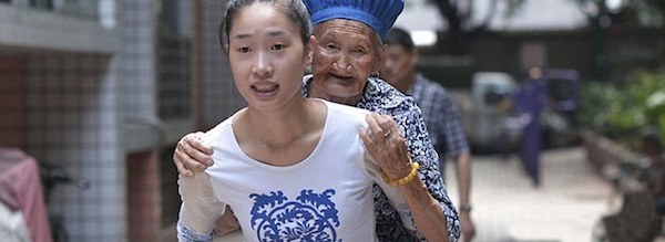 This Amazing Woman Carries Her Grandmother On Her Back To Work With Her.