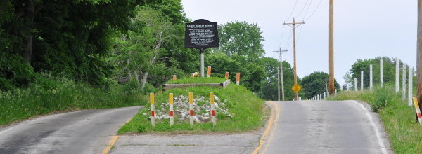 One Lonely Grave Sits In The Middle Of This Indiana Highway.