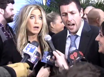 Reporter Scares Jennifer Aniston And Adam Sandler Simply By Standing Up.