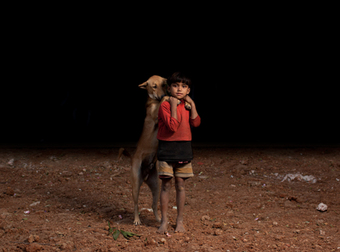 Photographer Sheds Light On Orphaned Children And Their Stray Dogs In Bangladesh.