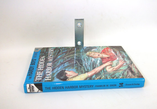 3.) I doubt the Hardy Boys can unravel the mystery of this floating bookshelf.