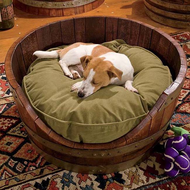 If you happen to have a spare wine barrel hanging around, turn it into bed for a medium to large sized dog.