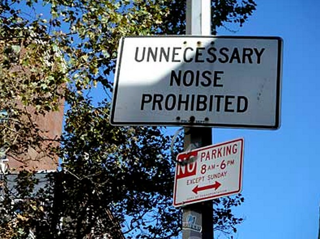 10.) This sign trusts you'll be the judge on whether or not your friend's outdoor black metal listening party is "unnecessary noise".