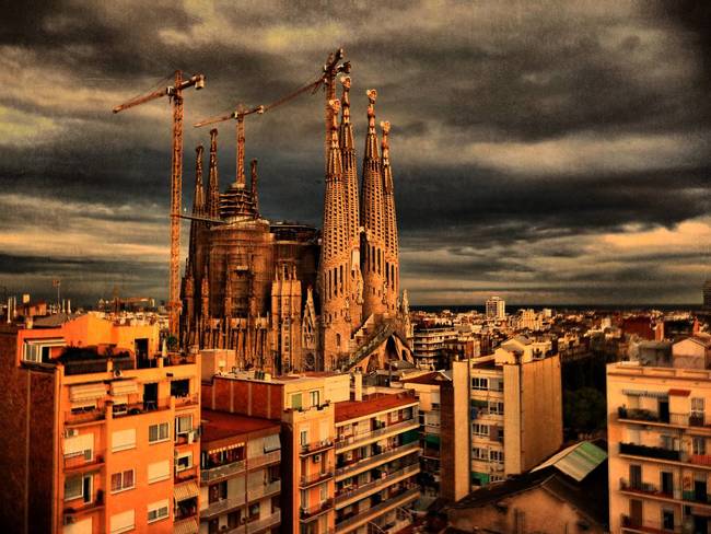 The Sagrada Familia is a church that was initially designed by Spanish artist/architect Antoni Gaudi.