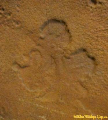 22.) Ariel's Grotto - Side Profile Mickey on wall