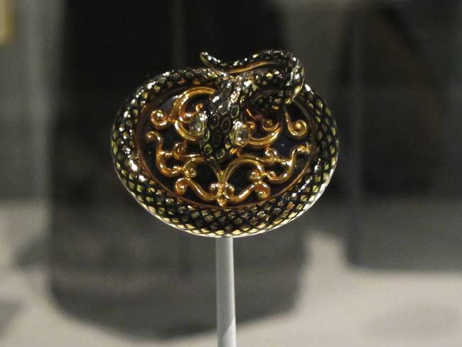 A snake brooch, specifically for mourning purposes.