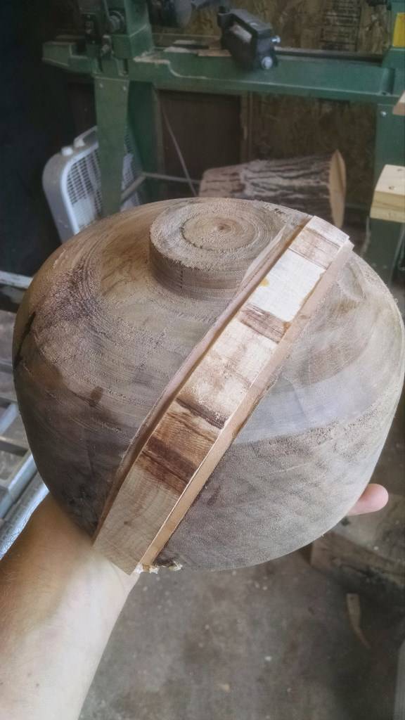 He replaced the section using a piece of maple with two pieces of cherry wood on either side. This combination would ensure that the bowl would stay intact when placed on the lathe that was running at 1,000 rpm.