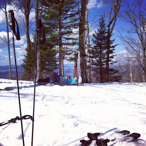 Taking a snowy nap after skiing 18,000 vertical feet at Burke Mountain in Vermont.