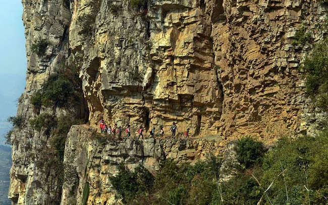 5.) Gulu, China - The children here have a 5 hour long hike into the mountains to get to school.