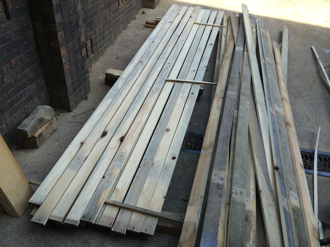 The planks of wood that will soon become the floorboards.