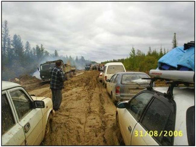 Traffic jams take on a whole new meaning with the wheels literally jammed into the muck.