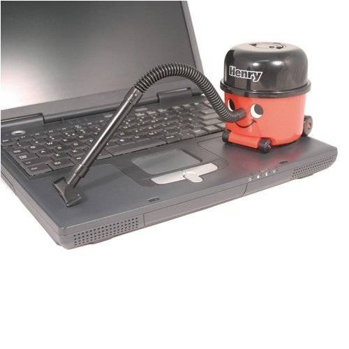 <a href="https://www.amazon.com/pal-PP0119-Henry-Desk-Vacuum/dp/B001GNTLGY/ref=sr_1_3?ie=UTF8&qid=1416933278&sr=8-3&keywords=usb+desk+vacuum&pebp=1416934732427">Henry Desk Vacuum </a> - This adorable lil' guy will make cleaning your laptop not seem like such a chore.