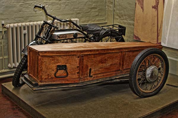 7.) Norton motorcycle and its side coffin.