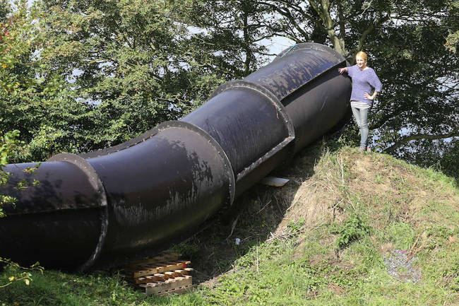 So far, about half of the water slide has been installed in the Betts' backyard.