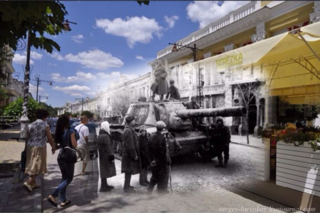 A tank drives through the streets.