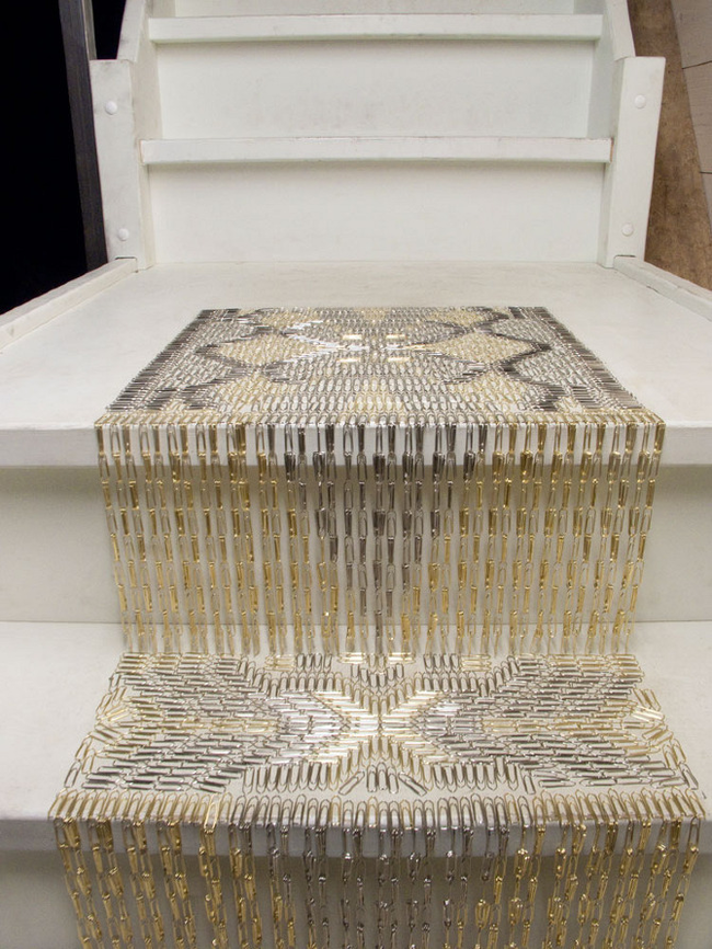 This classy stair carpet is made out of paperclips.