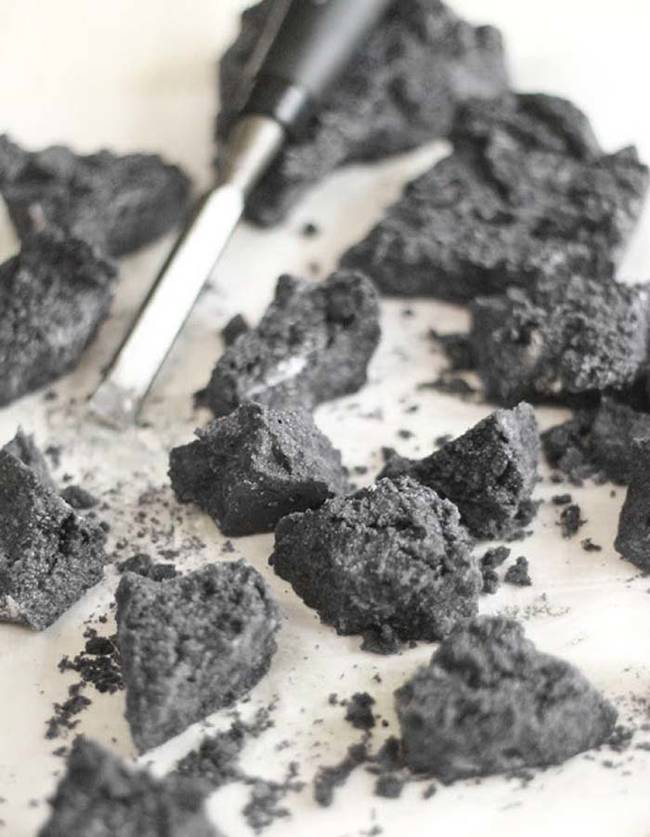 After the  mixture has hardened, use a chisel and hammer to break up the candy coal.