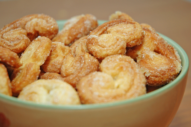 21. Palmiers: frozen puff pastry sheets + granulated sugar. Cover your surface with the granulated sugar, then put a heavier amount onto the pastry sheets. Fold and bake!