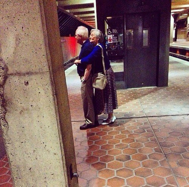 6.) This couple who makes waiting for a train worthwhile.