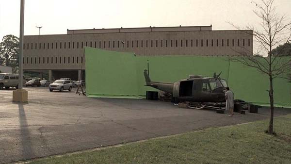 Before: a helicopter body in a parking lot.