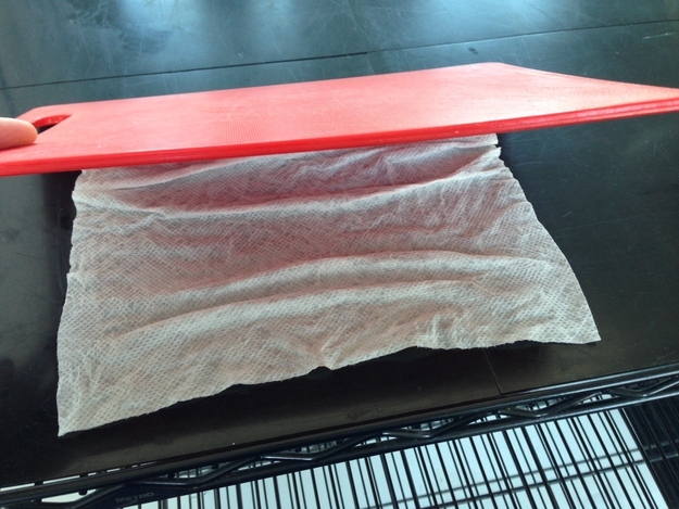 14. Use a damp paper towel under your cutting board to keep it from slipping around while you slice.