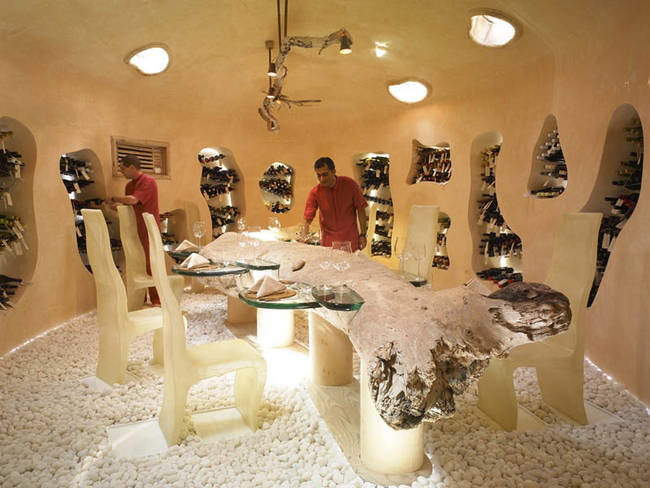 A luxurious dining room for fine meals (it's got a table made of driftwood, how awesome is that?)