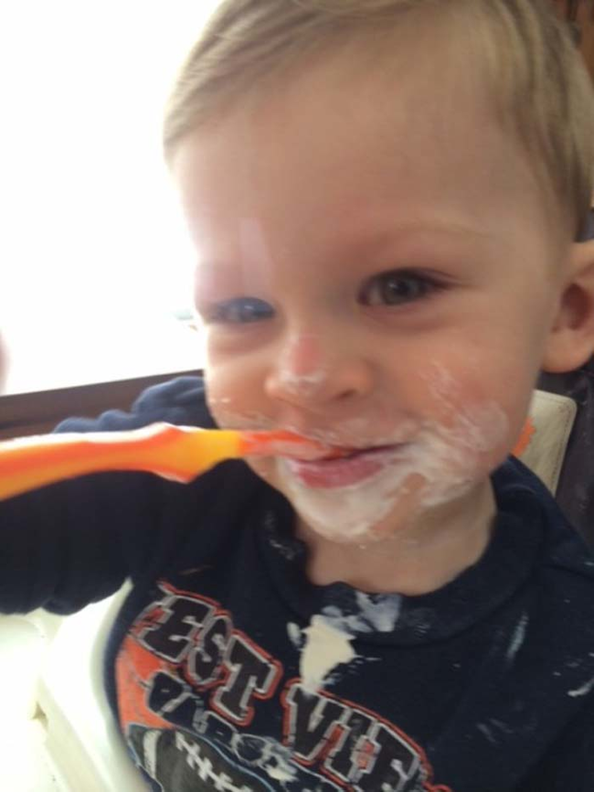 3.) Brushing his own teeth.