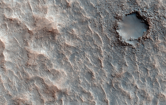 Fresh impact crater.