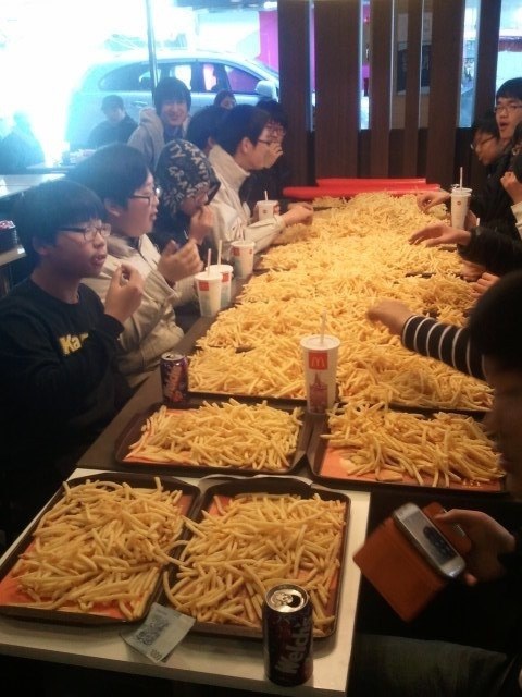 7.) Table Full of Fries - Marking your territory has never been so delicious.