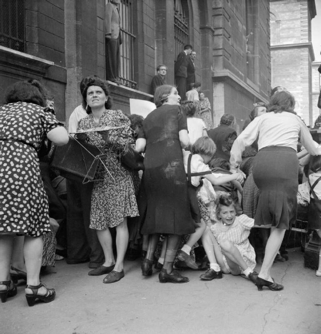 2.) French mothers shielding their children from gunfire in 1944.