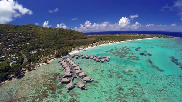 9.) An aerial view of beautiful beach huts (Moorea, French Polynesia).