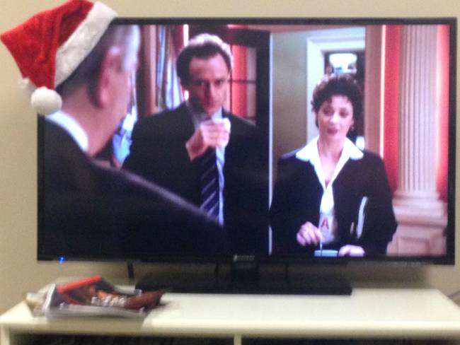 All you do is put that Santa hat on the corner of the TV (or laptop).