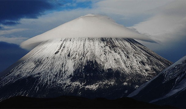 12. Lenticular Clouds: Probably mistaken for UFOs by Fox Mulder, these clouds occur when the moist air overflows a mountain.