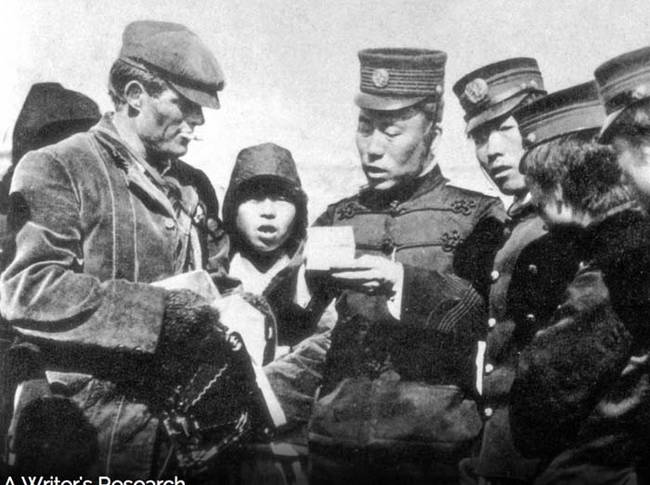 1.) Jack London and a group of Japanese soldiers inspecting his press credentials in 1904.