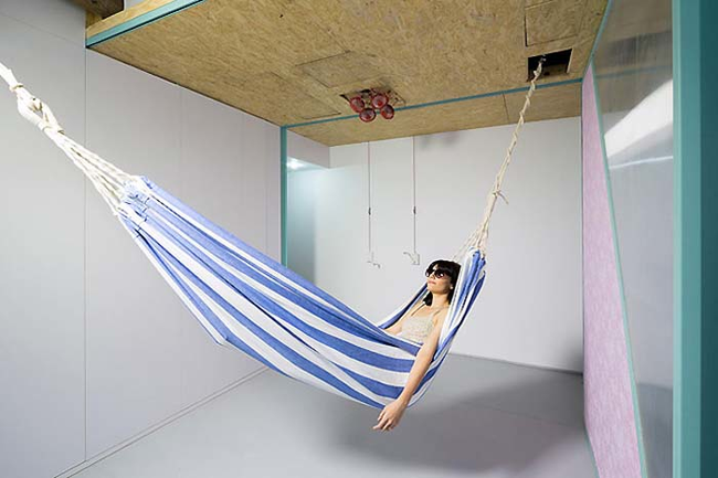 Also concealed in the ceiling is a hammock for maximum relaxing.