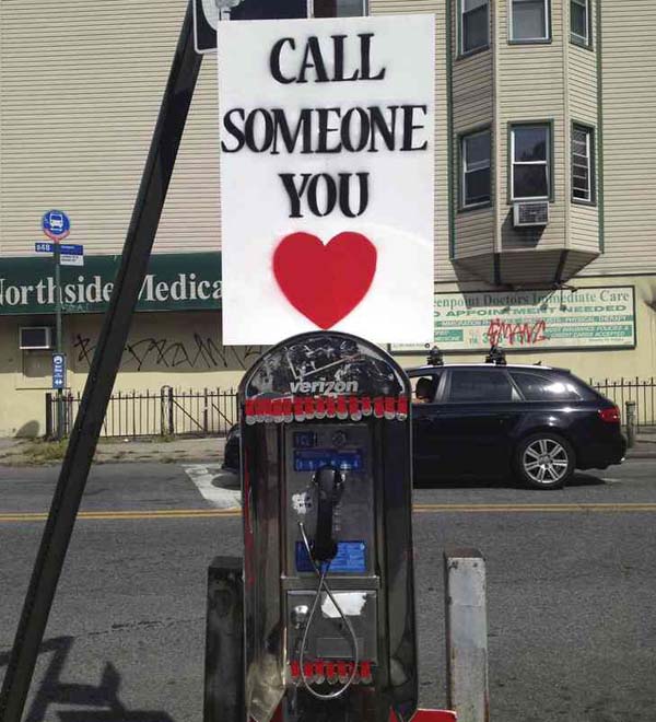 Matt and his friend Katie made this sign and attached it to a random New York City pay phone.