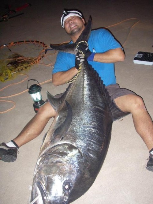 Keiki Hamasaki caught this giant trevally at a record size of 160lb. Then, according to the photo, probably worked it into his breakdance routine.