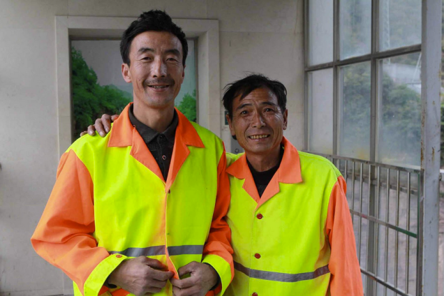 Here are Liu Jiancheng and Zhang Chengqing, unmasked, smiling, and rightfully proud of the work they do everyday.