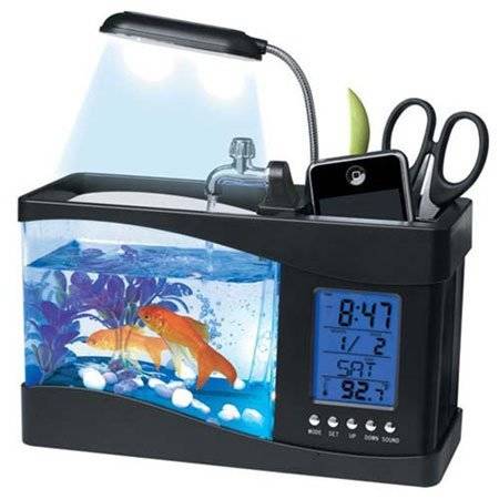 <a href="https://www.amazon.com/Fascinations-FISHQ1-USB-Desktop-Aquarium/dp/B004BS8SV0/ref=sr_1_19?ie=UTF8&qid=1417012700&sr=8-19&keywords=desk+gadget&pebp=1417012725785">Fascinations USB Desktop Aquarium</a> - This has everything you need and more. Having one of these little aquariums on your desk would be very relaxing during a stressful workday.