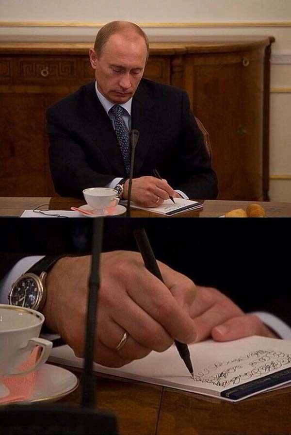 14.) Vladimir Putin takes really, really, really important notes.