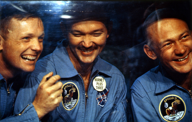 I almost thought this was a picture from the movie Apollo 13 because Buzz looks so much like Tom Hanks here. Also: are they drunk?