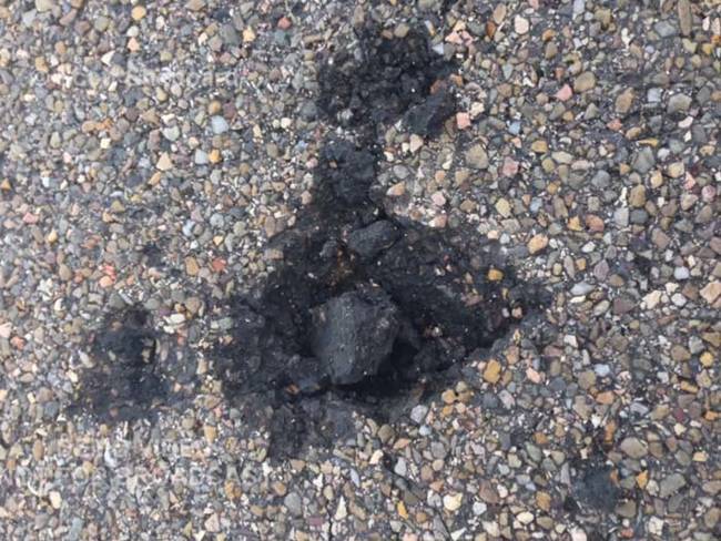 This is the hole where the lightning struck the pavement.