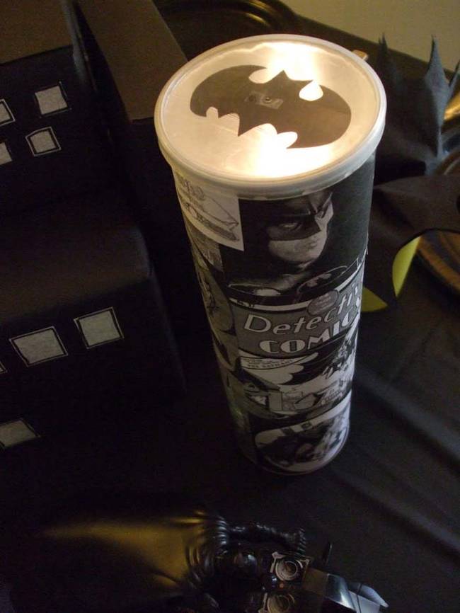 Make a bat signal out of a Pringles can and a flashlight. Check out the tutorial <a href="https://www.mycreativestirrings.com/2009/10/batman-birthday-party.html">here</a>.