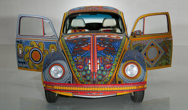 The resulting car represents various aspects of its Mexican homeland, including landscapes, religion, and flowers.