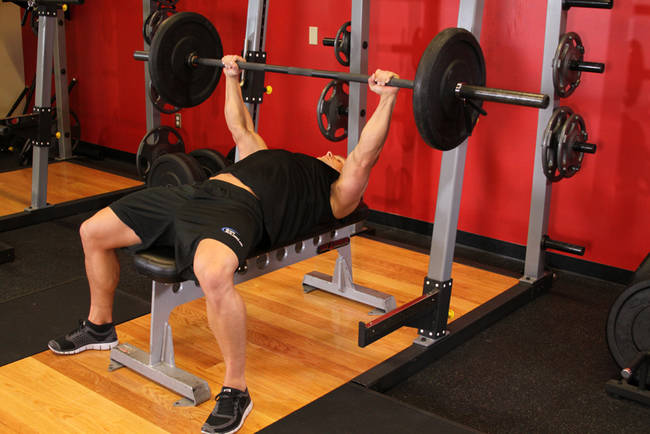 Bench pressing your own weight.