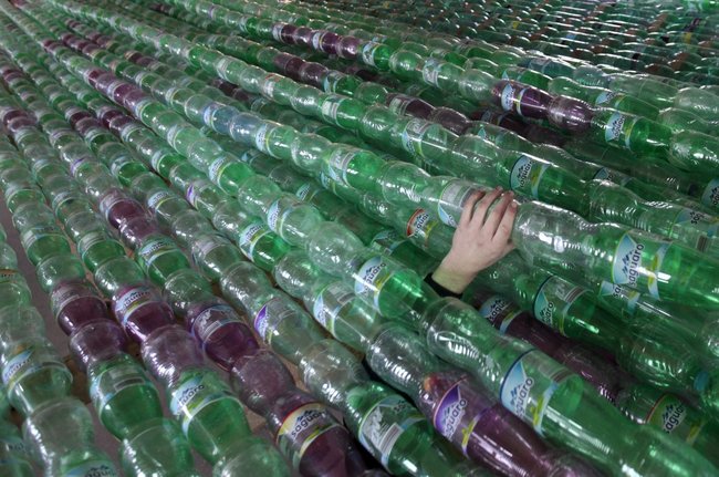 The duo used more than 50,000 bottles to construct their boat.