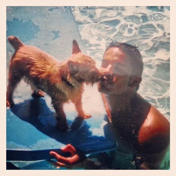 James with his beloved Elmo as a puppy.